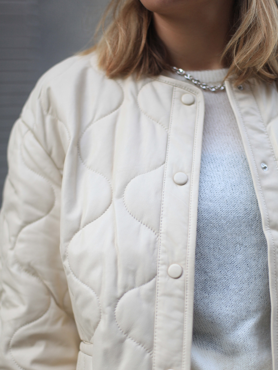 Short leather quilted bomber