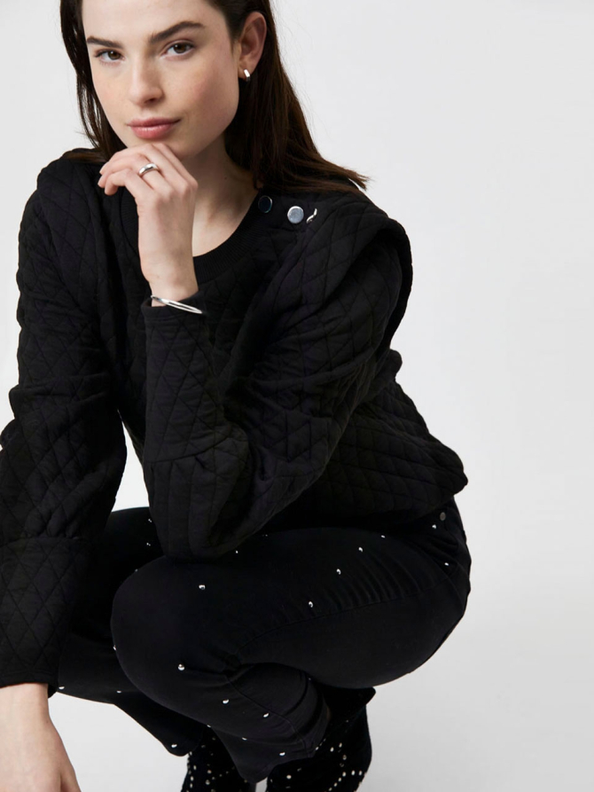 Black studded stretch denim